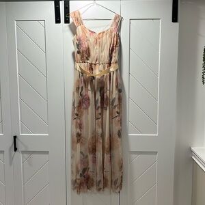 Cream and gold dress, with pink detailed flowers, and satin tie with bow